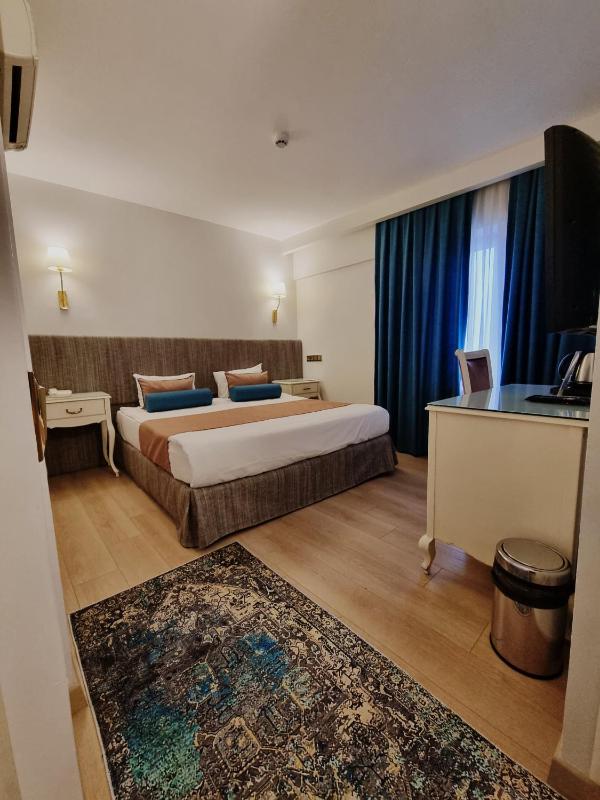 Taximtown Hotel - image 12