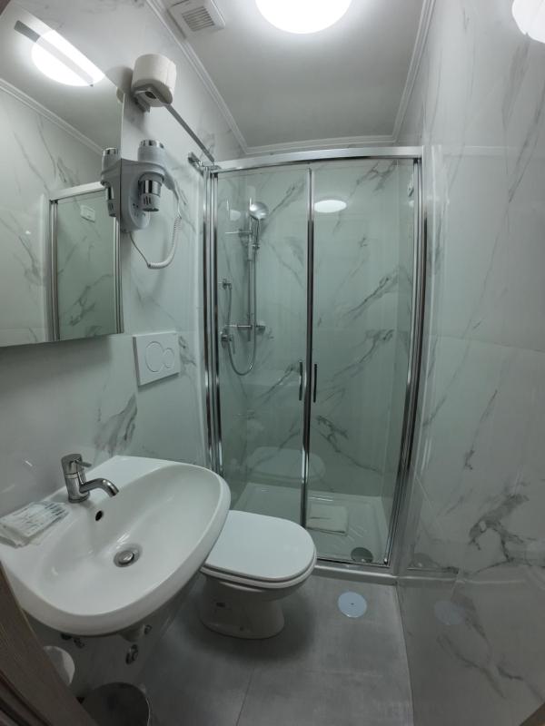 Quadruple Room with Private Bathroom image 1