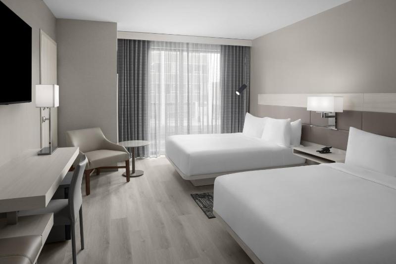 Corner Queen Room with Two Queen Beds image 1
