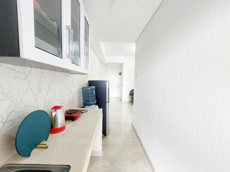 Comfort Stay 1BR at Podomoro City Deli Medan Apartment By Travelio - image 5