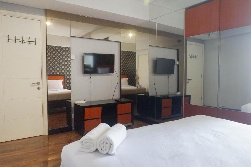 Vibrant and Luxurious 2BR Apartment at Trillium Residence Surabaya By Travelio - image 9
