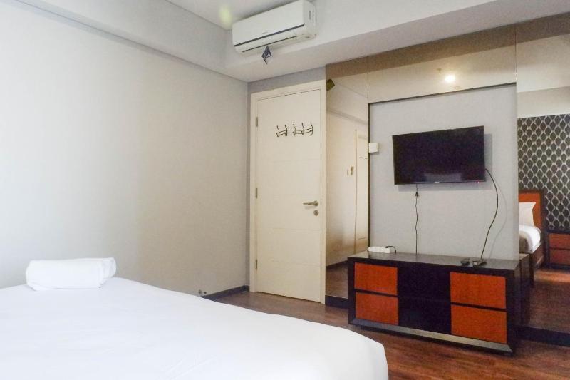 Vibrant and Luxurious 2BR Apartment at Trillium Residence Surabaya By Travelio - image 4
