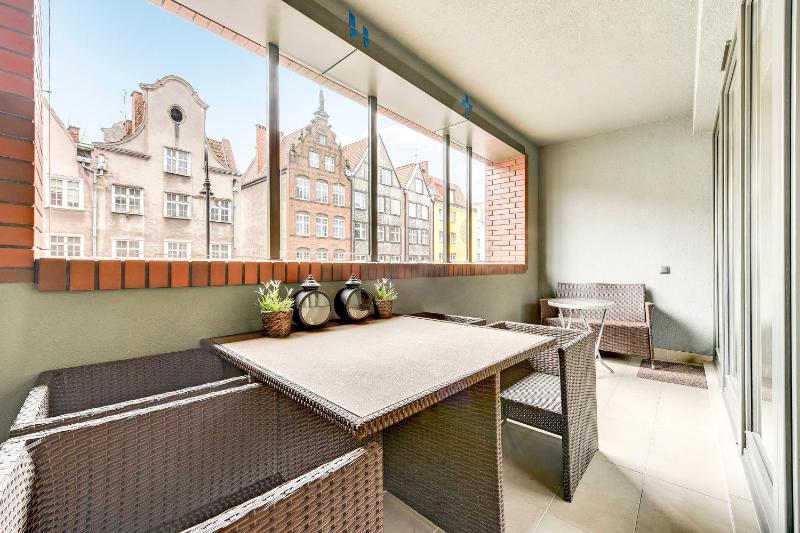 Deluxe Two-Bedroom Apartment with Balcony and City View image 1