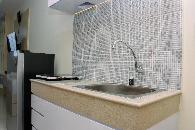 Elegant and Nice Studio at Evenciio Margonda Apartment By Travelio - image 6