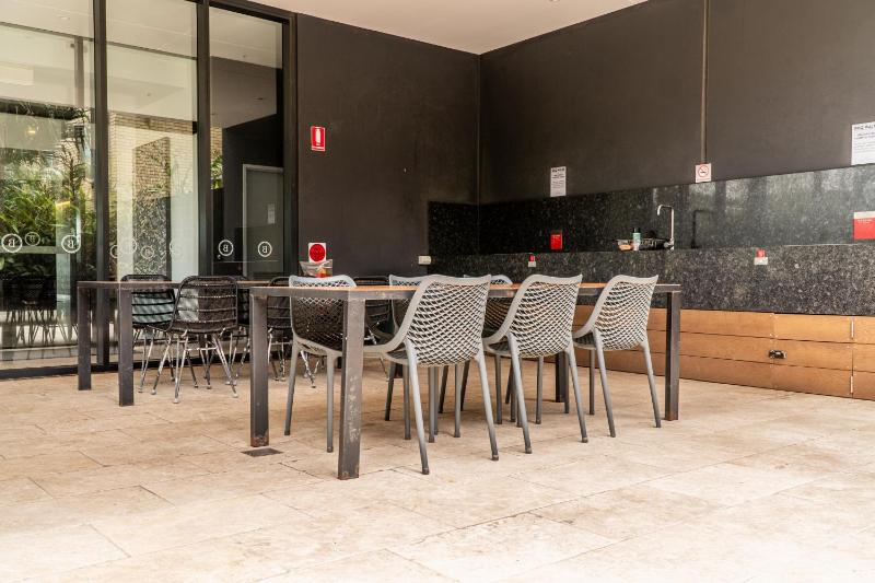 Beach front luxury with two carparks pool gym - image 2