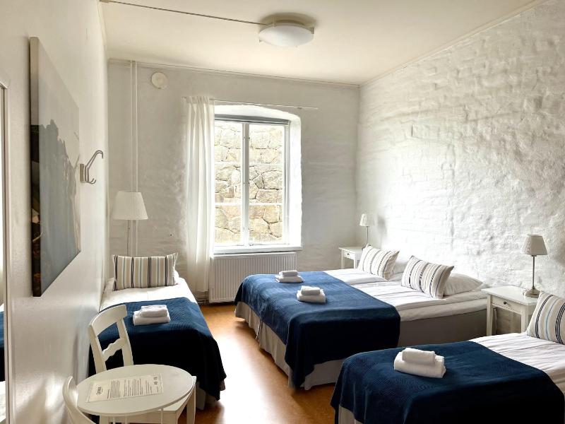 Standard Quadruple Room with Shared Bathroom image 1