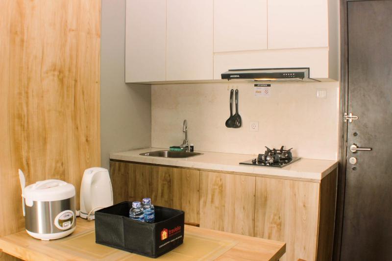 Stunning and Comfortable 1BR Apartment Mustika Golf Residence By Travelio - image 17