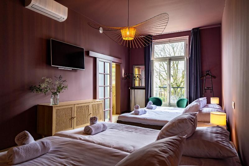 Quadruple Room with Private Bathroom image 1
