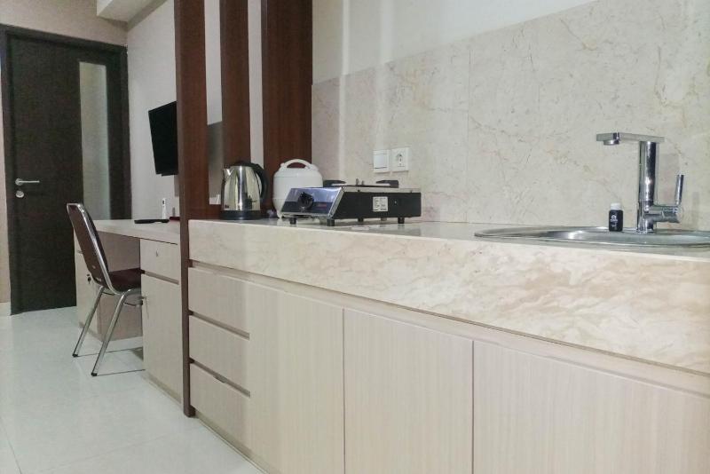 1BR with Cozy Design at Uttara The Icon Apartment By Travelio - image 9