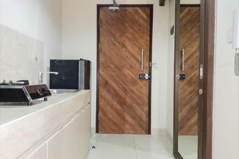 1BR with Cozy Design at Uttara The Icon Apartment By Travelio - image 7