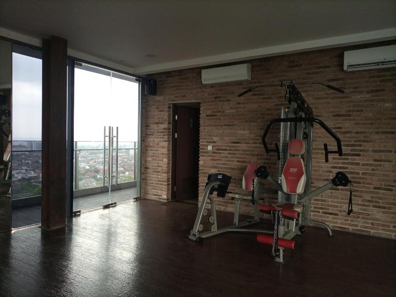 1BR with Cozy Design at Uttara The Icon Apartment By Travelio - image 11