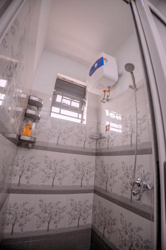 Tranquil - 2 bedroom Spacious Condo with WIFI 20 mins from KAMPALA CENTER - image 16