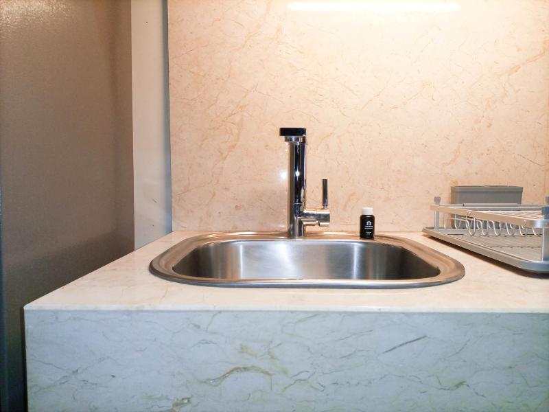 Elegant and Tidy 1BR at Uttara The Icon Apartment By Travelio - image 5