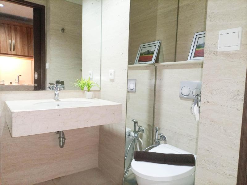 Elegant and Tidy 1BR at Uttara The Icon Apartment By Travelio - image 9