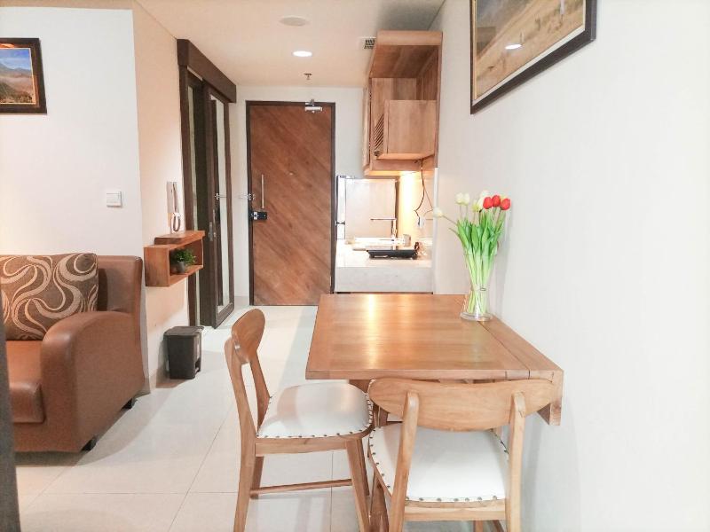 Elegant and Tidy 1BR at Uttara The Icon Apartment By Travelio - image 4