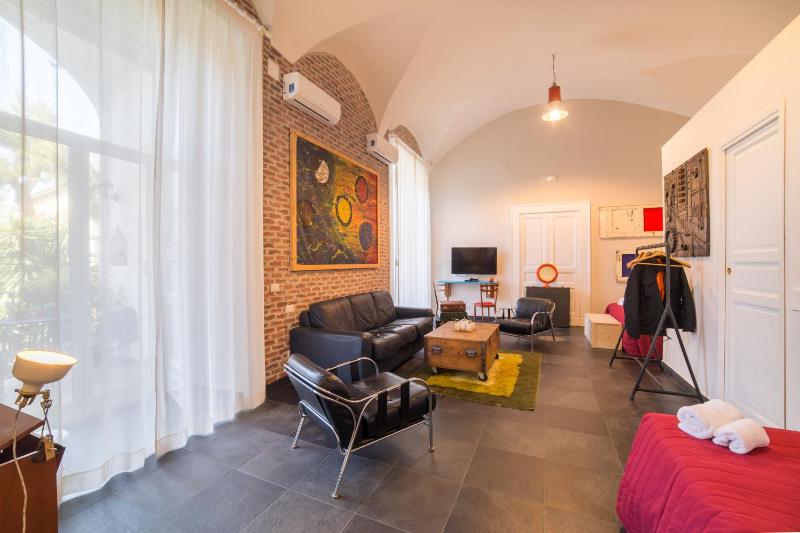 Suite with Balcony and Garden View