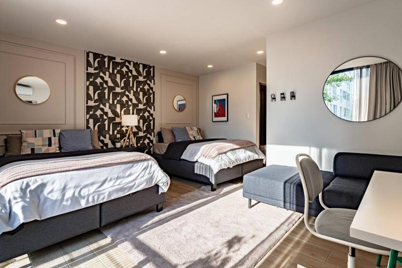 Stylish Roma Sur Home with Rooftop Lounge & BBQ - image 12
