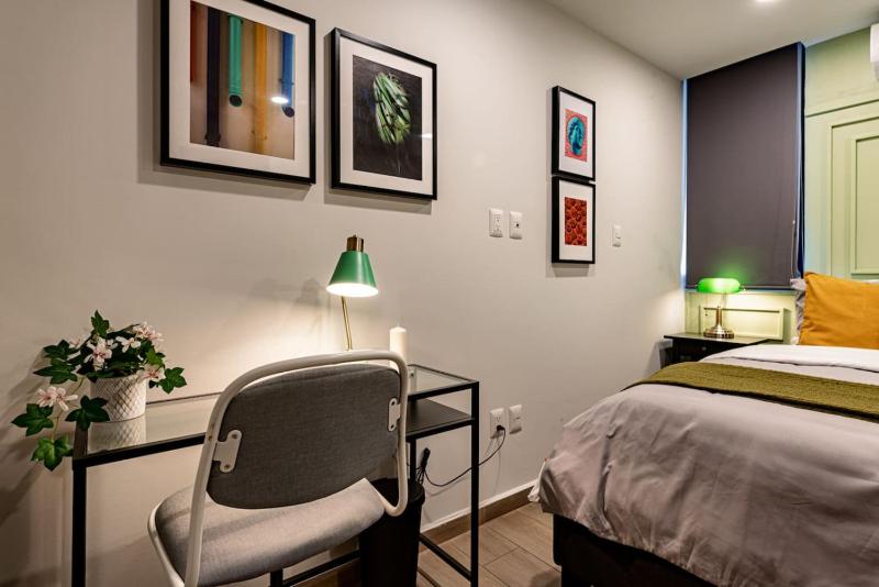 Stylish Roma Sur Home with Rooftop Lounge & BBQ - image 23