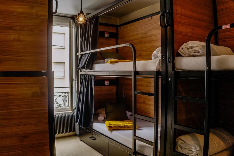 Bed in Mixed dormitory room with shared bathroom image 2