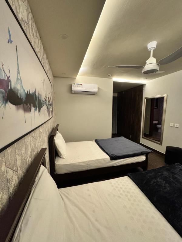Lux Haven 2-Bedroom Apartment - Prime Location & Modern Comfort Near Gulberg - image 14