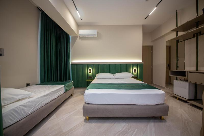 Superior Triple Room with Balcony and Side Sea View image 4