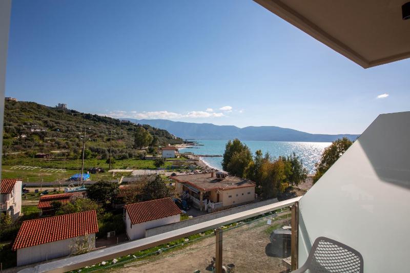 Superior Triple Room with Balcony and Side Sea View image 2