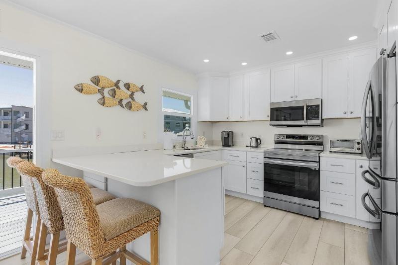 920 Bay Breeze Bungalow- Stunning Bay View Home with Heated Pool! home - image 22
