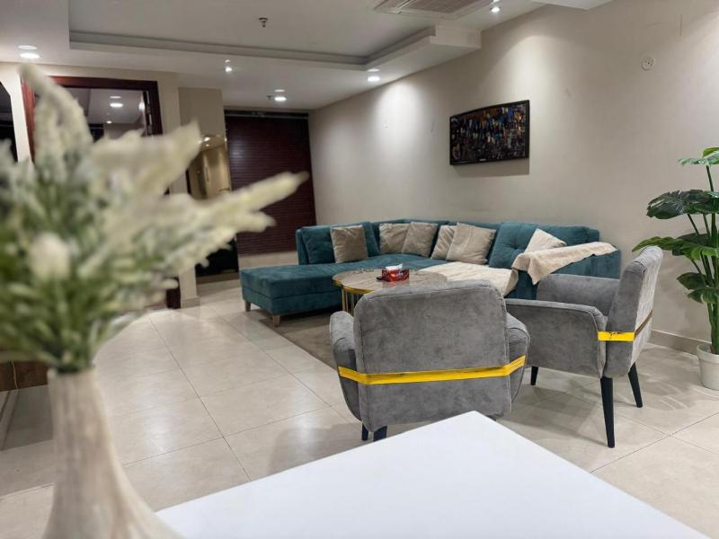 Elevated Luxury Gold Crest Mall Apartments with Al Fatah store by HBA - image 3
