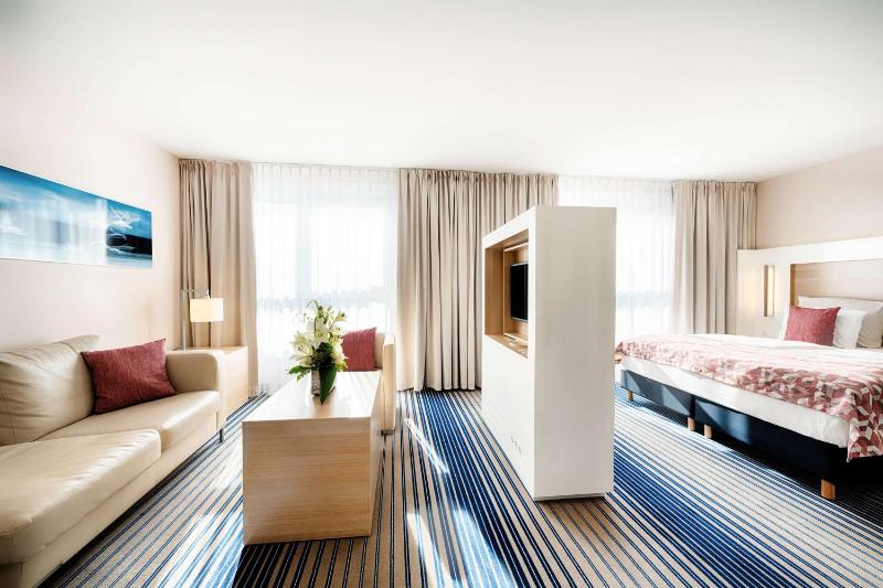 Junior Suite with Two Single Beds and One Sofa Bed image 3