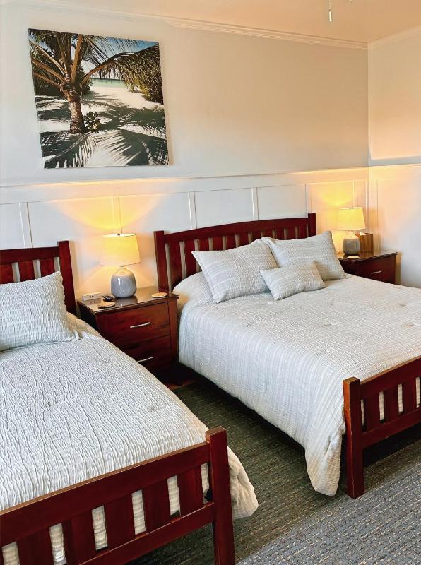Quadruple Room with Private Bathroom image 1