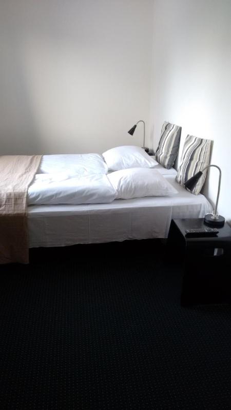 Budget Quadruple Room with Private Bathroom image 1