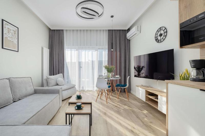 Cozy Studio with River View Spadochroniarzy with Parking & SPA by Noclegi Renters - image 13