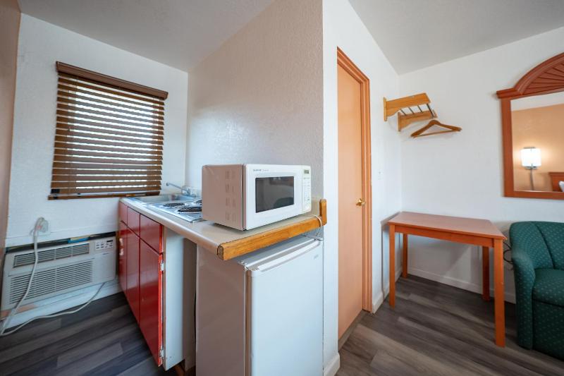 Premium Queen Bed with Kitchenette image 3
