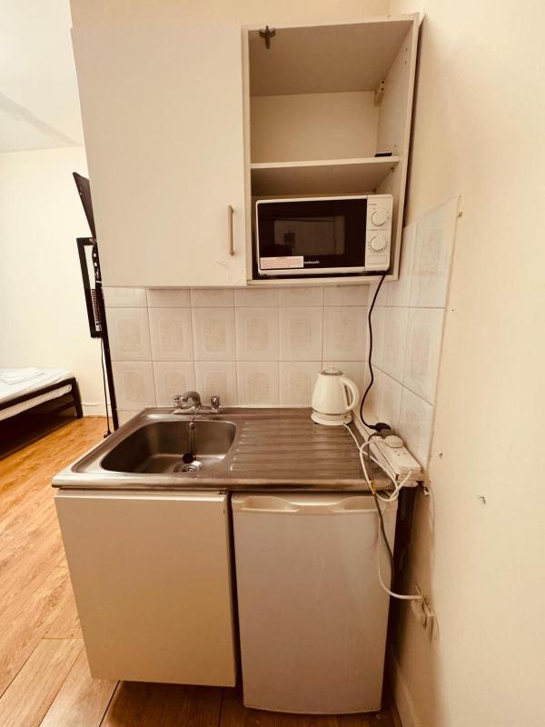 Quadruple Room with Private Bathroom image 2