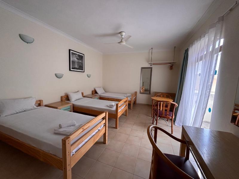 Triple Room with Balcony (3 Adults + 1 Child) image 3