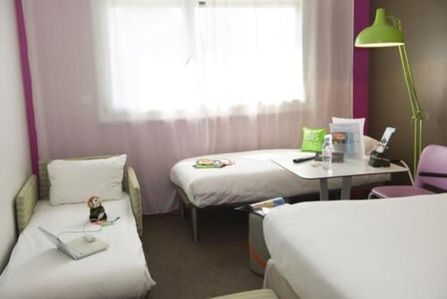 Standard Room with One Double Bed and Two Single Beds image 1