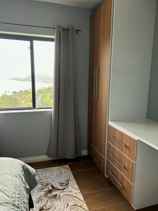 Serene Sunset Escape - Panoramic Ocean View Apartment - image 12