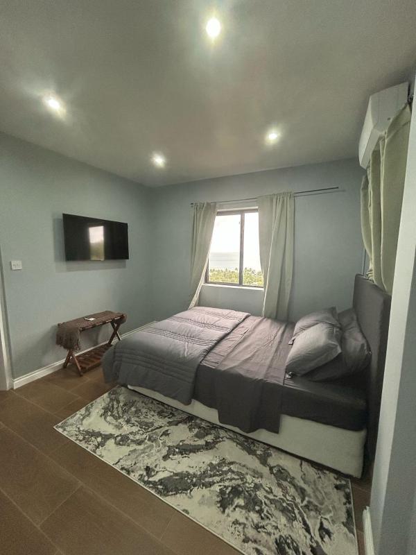 Serene Sunset Escape - Panoramic Ocean View Apartment - image 11