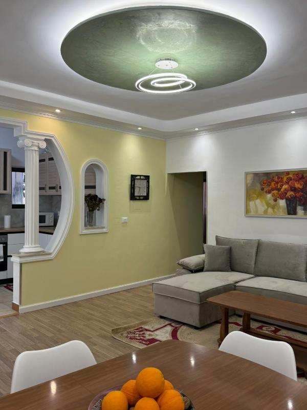 Central Comfort 2BR with Lush Living Room - image 1