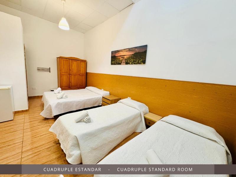 Quadruple Room with Private Bathroom image 1