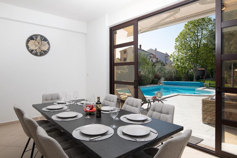 Villa Andrija Family Dream with heated pool at the sea with beautiful garden outside cinema and kids playground - image 27