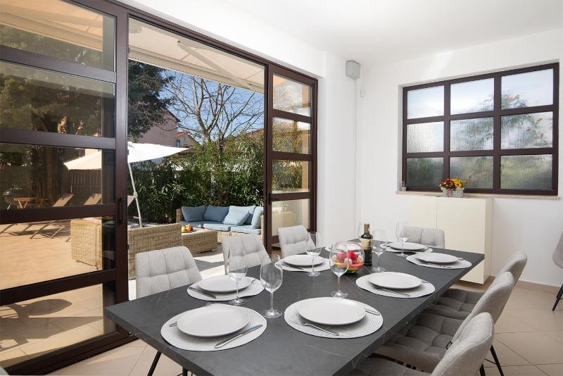 Villa Andrija Family Dream with heated pool at the sea with beautiful garden outside cinema and kids playground - image 9