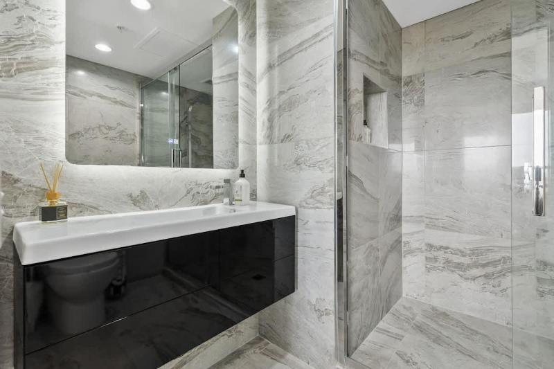Modern 1BR w Pool Gym Steps to Beach by Zodiak Stays - image 3