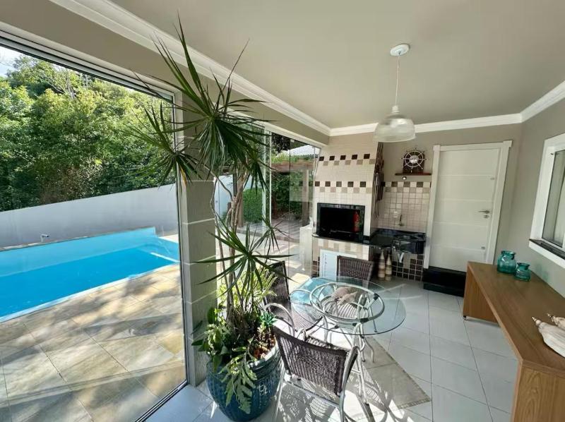 Casa Aconchegante com piscina - image 3
