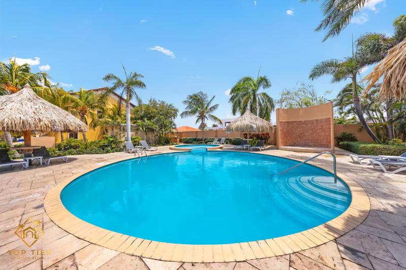 2BR Apt with Private Pool BBQ & 3 Min to Arashi Beach - image 7