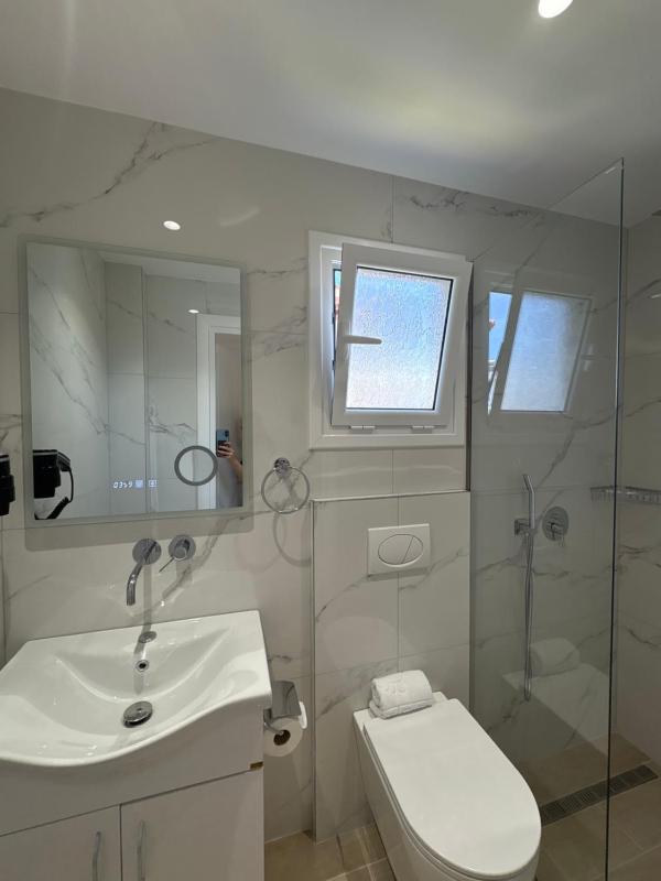 Xhonis Apartments - image 15