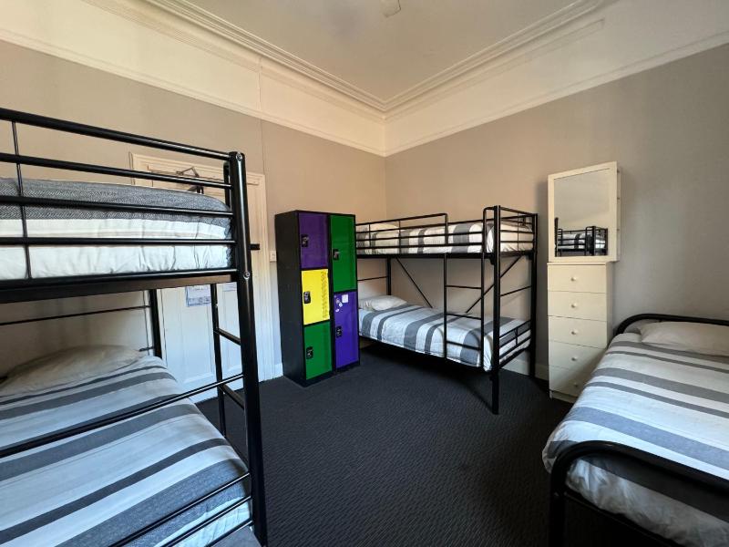 Bed in Mixed 5-Bed Dormitory Room with Private Bathroom image 1