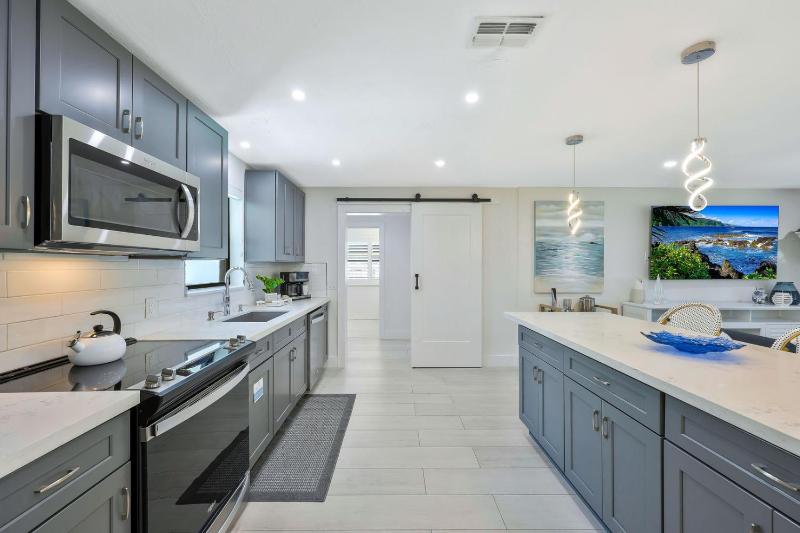 New Listing! Canal Dreaming - Salt Pool - Water View with Dock - image 30