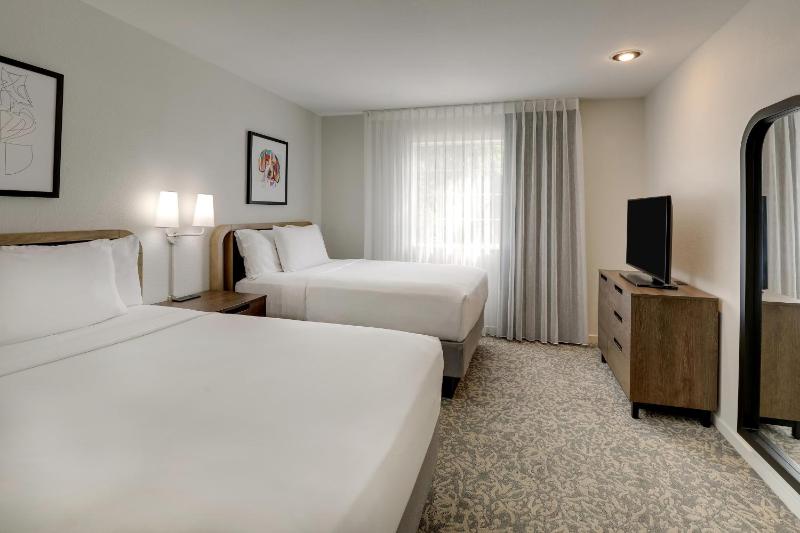 Two-Bedroom Suite with Queen and Two Double Beds image 1