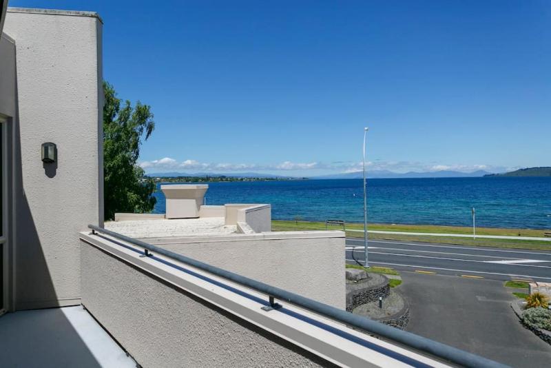 Lakefront Living 3-Level Home With Spectacular Water and Mountain Views - image 31